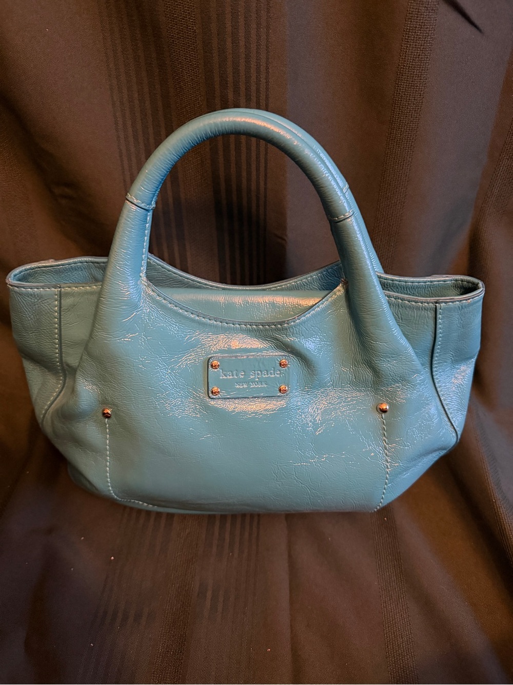 kate spade teal blue leather satchel with rounded handles